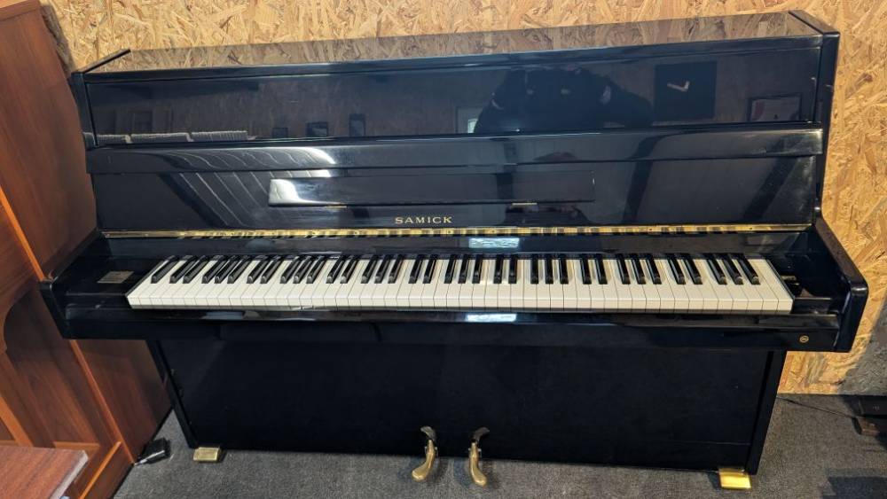 samick 105 compresse